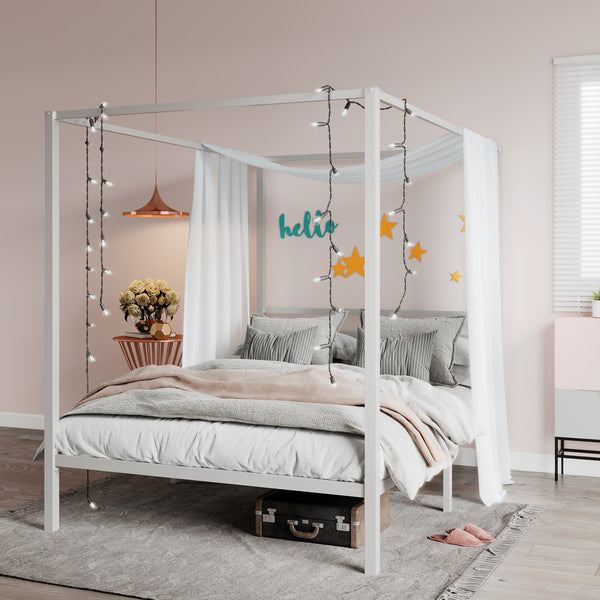 white metal canopy bed